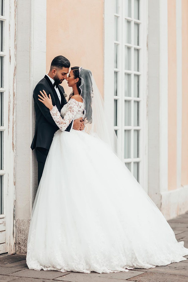 Gorgeous White Long Sleeve Lace Ball Gown with Floral Tulle